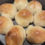 Buttered rolls after removing from oven